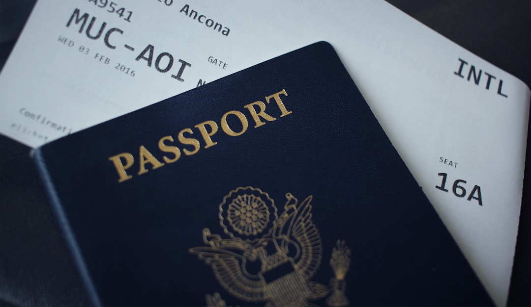 passport-booklet-on-top-of-white-paper-gmj3tfolvna